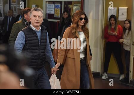 Buenos Aires, Argentina. 11th August 2019. Argentinian President MAURICIO MACRI arrives with his wife JULIANA AWADA at school number 16.Wenceslao Posse, to vote during the primary elections for President and Parliamentary, in City of Buenos Aires, Argentina, August 11, 2019.After casting he makes a speech.The general election will be on October 27, 2019. (Credit Image: © Julieta FerrarioZUMA Wire) Credit: ZUMA Press, Inc./Alamy Live News Stock Photo