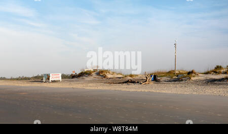 Early morning at the south end of Tybee Island beach. A view of the dunes on the south end of the island Stock Photo