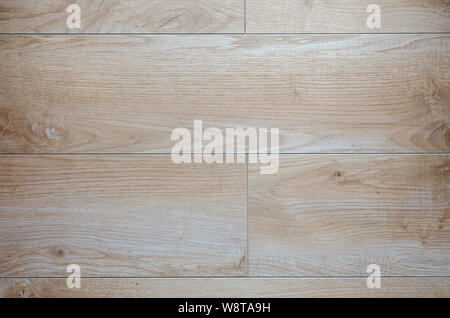 Beige and brown floor tiles with wooden look – suitable as a background Stock Photo