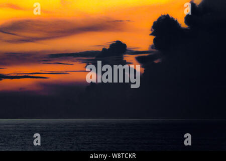 Caribbean sunset - tropical dramatic sunset south of Bermuda - colorful sunset southern Atlantic ocean - Bermuda sunset over sea Stock Photo