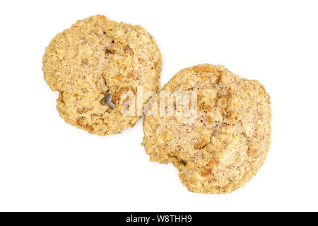 Group of two whole crispy oat crumble biscuit flatlay isolated on white background Stock Photo