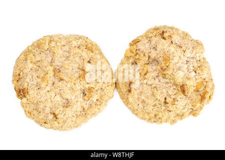 Group of two whole oat crumble biscuit flatlay isolated on white background Stock Photo
