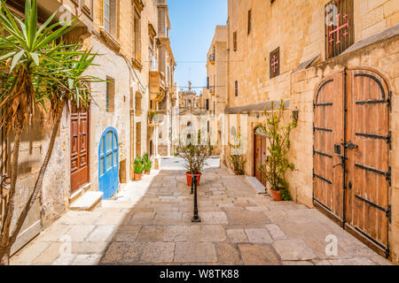 Narrow street in city centre of Valletta, Malta. Stock Photo