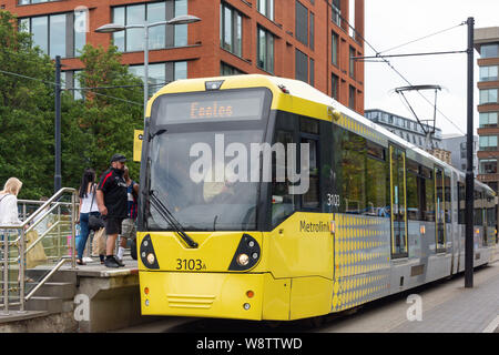 Metrolink metro train at Piccadilly Gardens station, Manchester, Greater Manchester, England, United Kingdom Stock Photo
