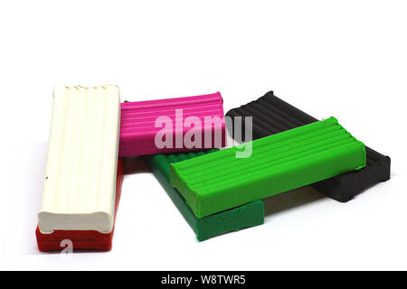Children bright plasticine isolated on white background Stock Photo