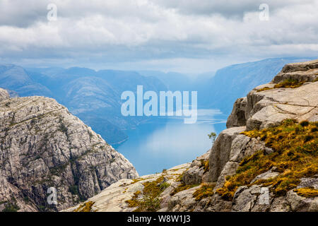 Mountain view to the long narrow norwegian fjord, Lysefjord, Prekestolen hiking trail, Forsand, Rogaland county, Norway Stock Photo