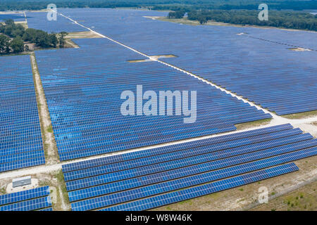 Aerial view of large solar panel farm in Northern Florida providing clean energy. Stock Photo