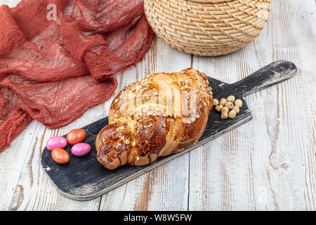 Easter bread with nuts and raisins. Sweet pastries with nuts and raisins. Easter buns. Stock Photo