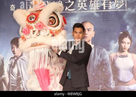 Taiwanese actor Eddie Peng poses during a press conference for his new movie 'Rise of the Legend' in Taipei, Taiwan, 27 November 2014. Stock Photo