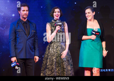 (From left) American actor Matthew McConaughey, American actress Anne Hathaway and British film producer Emma Thommas arrive at the premiere of their Stock Photo