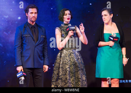 (From left) American actor Matthew McConaughey, American actress Anne Hathaway and British film producer Emma Thommas arrive at the premiere of their Stock Photo