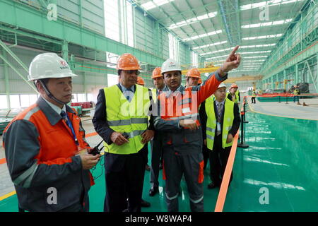 Lakshmi Mittal, second left, Chairman and CEO of ArcelorMittal, is accompanied by Sanjay Sharma, front right, CEO of Valin ArcelorMittal Automotive St Stock Photo