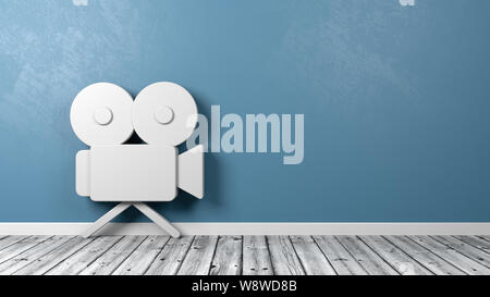 White Old Video Camera 3D Symbol Shape on Wooden Floor Against Blue Wall with Copy Space 3D Illustration Stock Photo