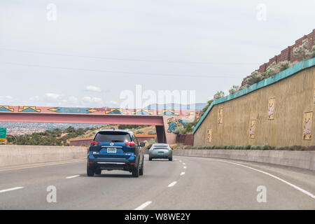 Santa Fe, USA - June 17, 2019: Road US Highway 285 in New Mexico with decorations design colorful artwork on walls Stock Photo