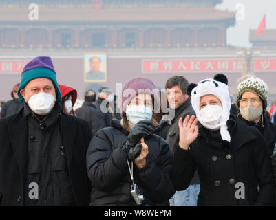 Foreign tourists visit the Tiananmen Square in Beijing, China, 1 March ...