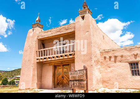 Las Trampas San Jose de Gracia church on High Road to Taos village with historic vintage building in New Mexico with sign Stock Photo