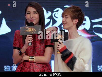 Taiwanese singer Elva Hsiao, left, and Chinese writer Guo Jingming attend a press conference for the reality TV show, Road to Star, in Pinghu city, ea Stock Photo