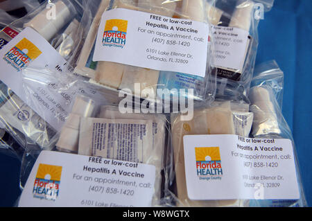 Orlando, United States. 11th Aug, 2019. Hygiene kits are offered to attendees at a hepatitis A vaccination event sponsored by the Orange County, Florida Health Department in response to the hepatitis A outbreak in the State of Florida and the August 1, 2019 declaration of a public health emergency in the state. As of July 1, 2019, twenty-seven states have experienced outbreaks of the disease, with Florida having 2,586 reported cases, the third highest in the United States, resulting in 31 deaths. Credit: SOPA Images Limited/Alamy Live News Stock Photo