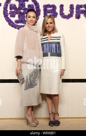 Stylist Tory Burch and Chief Executive of LVMH Fashion Group Pierre-Yves  Roussel attending the Amfar dinner as part of Paris Fashion Week at the  Peninsula Hotel in Paris, France on July 03