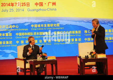 Former UK Prime Minister Tony Blair, left, and Yan Jiehe, founder and chairman of Pacific Construction Group, attend the 4th Huatuo CEO Forum in Guang Stock Photo
