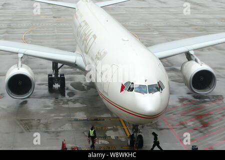 --FILE--An Airbus A330-300 jet plane of Etihad Airways is pictured on the parking apron after landing at the Shanghai Pudong International Airport in Stock Photo