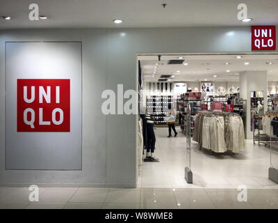 FILE--View of a Uniqlo store in Guangzhou city, south China's Guangdong  province, 26 September 2015. Uniqlo, a Japan-based clothing company, repor  Stock Photo - Alamy