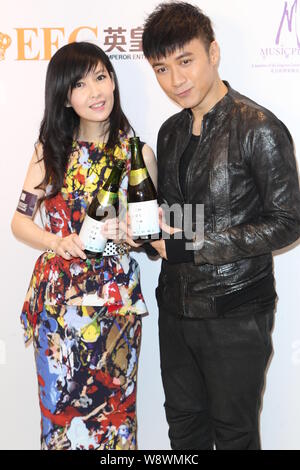 Hong Kong singer and actor Leo Ku Kui-kei, right, poses with singer and ...