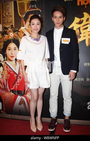 Hong Kong actress Niki Chow, left, and Chinese actor Jeremy Jones pose during a promotional event for their TV drama 'The Virtuous Queen of Han' in Ho Stock Photo