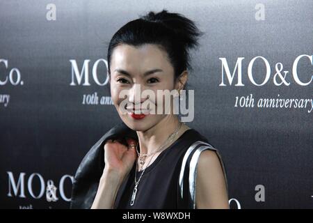 Hong Kong actress Maggie Cheung poses at a fashion event for the 10th anniversary of MO&Co. in Guangzhou city, south Chinas Guangdong province, 18 Jul Stock Photo