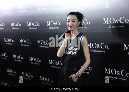 Hong Kong actress Maggie Cheung poses at a fashion event for the 10th anniversary of MO&Co. in Guangzhou city, south Chinas Guangdong province, 18 Jul Stock Photo