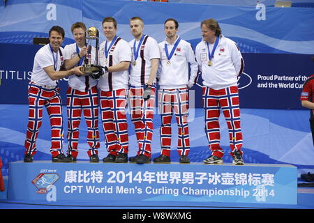 (From left) Curlers Thomas Ulsrud, Torger Nergard, Christoffer Svae, Havard Vad Petersson, Markus Hoiberg and coach Pal Trusen of Norway pose with the Stock Photo