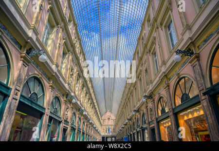 The Saint-Hubert Royal Galleries are an ensemble of glazed shopping arcades in Brussels, Belgium. Stock Photo