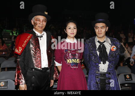 Hong Kong actress Miriam Yeung, center, poses at a charity event of Hong Kong Girl Guides Association in Hong Kong, China, 18 September 2014. Stock Photo