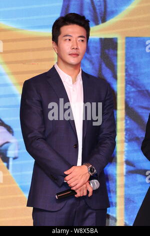 South Korean actor Kwon Sang-woo poses during a press conference to mark the completion of the filming of his new movie 'Honey Enemy' in Shanghai, Chi Stock Photo