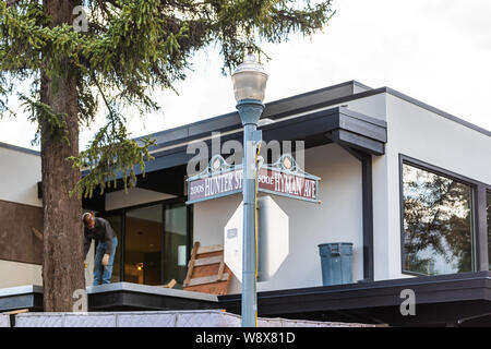 Aspen, USA - June 27, 2019: Town in Colorado with closeup of intersection sign on Hunter street and Hyman avenue Stock Photo