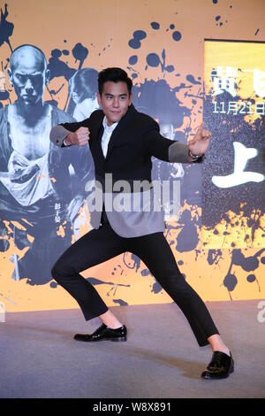 Taiwanese actor Eddie Peng poses during a press conference for his new movie 'Rise of the Legend' in Shanghai, China, 24 November 2014. Stock Photo