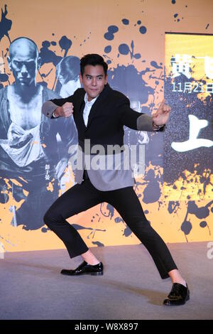 Taiwanese actor Eddie Peng poses during a press conference for his new movie 'Rise of the Legend' in Shanghai, China, 24 November 2014. Stock Photo