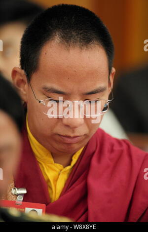 The 11th Panchen Lama Bainqen Erdini Qoigyijabu (or Erdeni Gyaincain Norbu) attends the opening meeting of the Second Session of the 12th NPC (Nationa Stock Photo