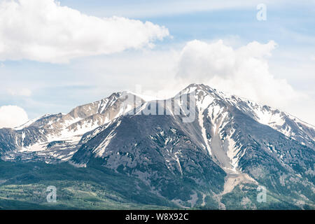 Mt Sopris mountain in Colorado town with closeup of snow mountain view with peak and sky in summer Stock Photo