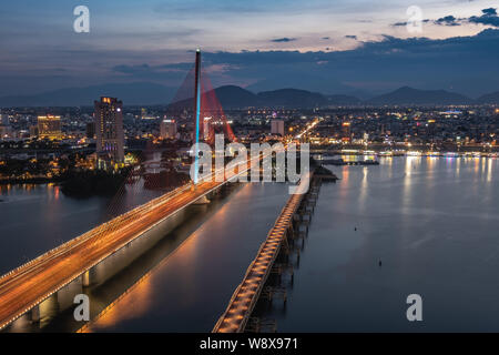 Overview of Danang city at dusk and night time, Vietnam