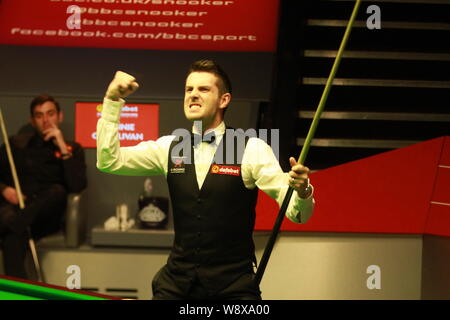 Mark Selby of England celebrates after defeating Ronnie OSullivan of England in the final of the World Snooker Championship in Sheffield, England, 5 M Stock Photo
