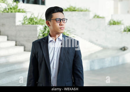 Young pensive entrepreneur Stock Photo