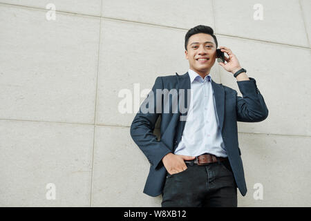 Businessman making phone call Stock Photo