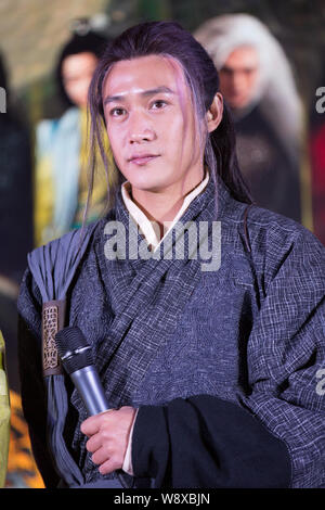 Chinese actor Lu Yi dressed in an ancient costume poses at a press conference for his new TV drama 'The Legend of Qin' at Xiangshan Motion Picture Cit Stock Photo