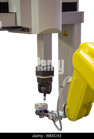Robotic arm loading workpiece to CNC CMM Coordinate Measuring Robotic isolated on white background Stock Photo