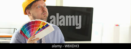 Dreamy Adult Designer Holding Paint Colour Palette Stock Photo