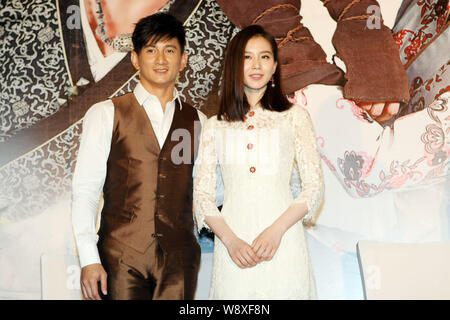 Taiwanese singer and actor Nicky Wu, left, and his actress girlfriend Liu Shishi pose during a press conference for their new TV series, Incisive Grea Stock Photo