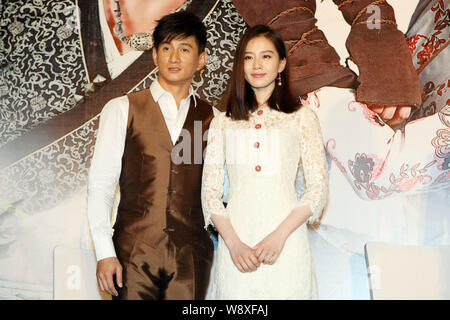 Taiwanese singer and actor Nicky Wu, left, and his actress girlfriend Liu Shishi pose during a press conference for their new TV series, Incisive Grea Stock Photo