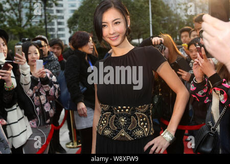 Hong Kong singer and actress Cecilia poses on the red carpet as she at the launch ceremony for reality TV talent show, Diva, in S Stock Photo - Alamy