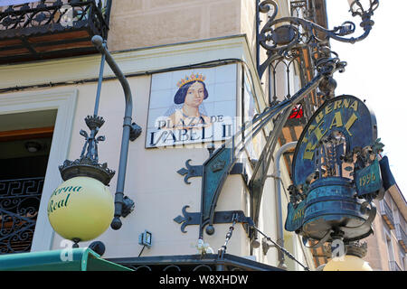 MADRID, SPAIN - JULY 2, 2019: Close up of the street sign of the square Plaza de Isabel II Stock Photo